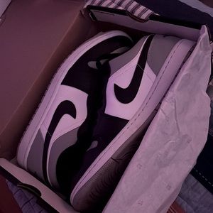 I am selling Air Jordan Lows ( Black and Gray )